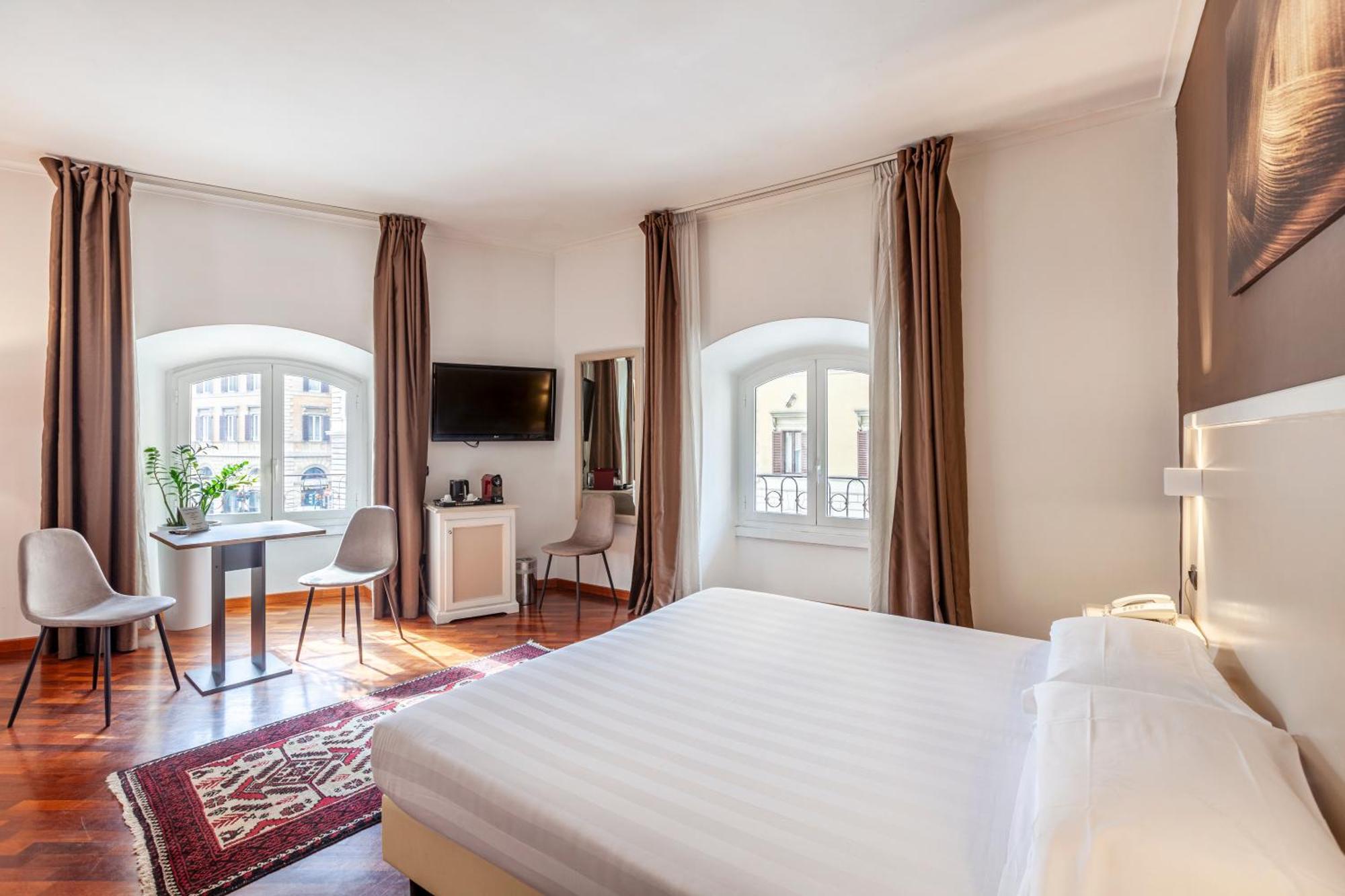 Inn Rome Rooms & Suites — Fotos 2