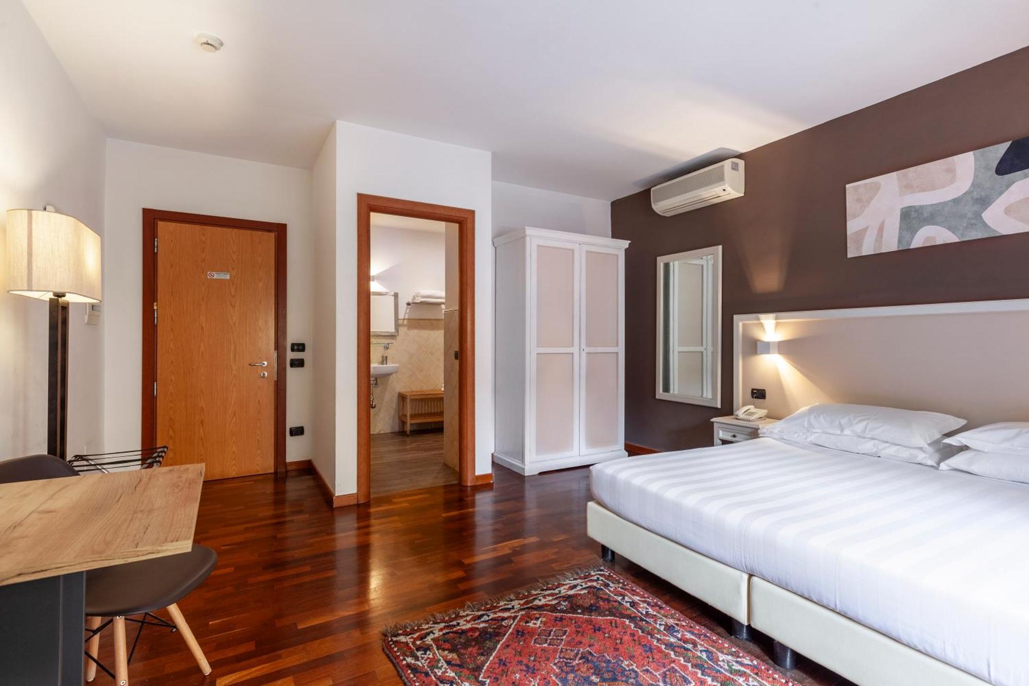 Inn Rome Rooms & Suites — Fotos 1